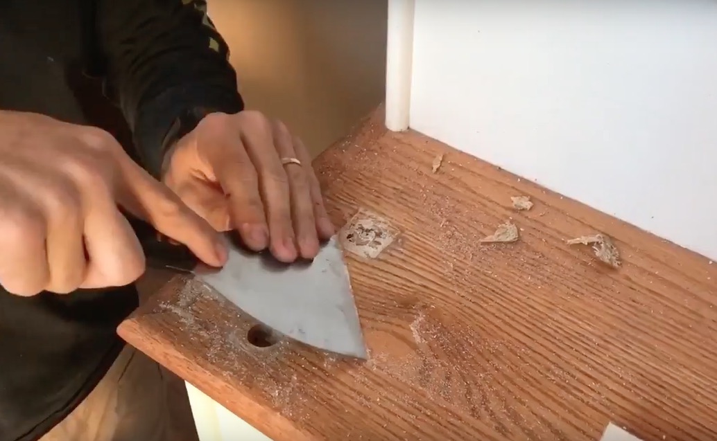 Scrape away dried glue