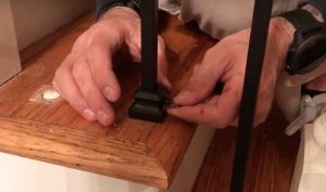 Adjust baluster height and secure in place