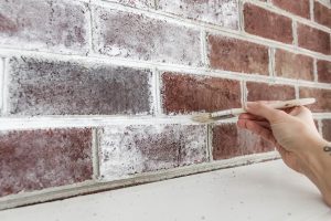 Method: Whitewashing fireplace grout