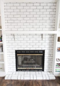 After: Rough Painted Brick Fireplace